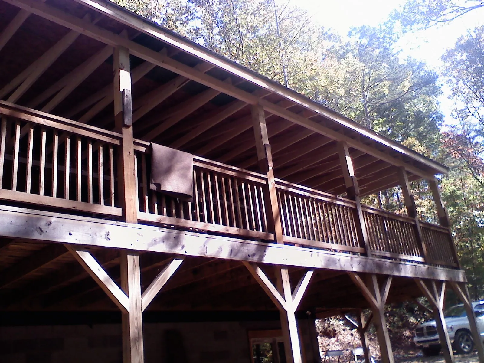 Timber framing under a new elevated porch and deck — Roof Leak Repair in Lenore by Roofing Brothers